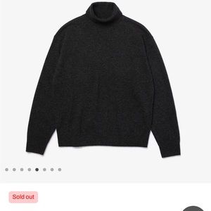 New with tags! Lacoste tan turtleneck sweater. Size 36/4 women's.